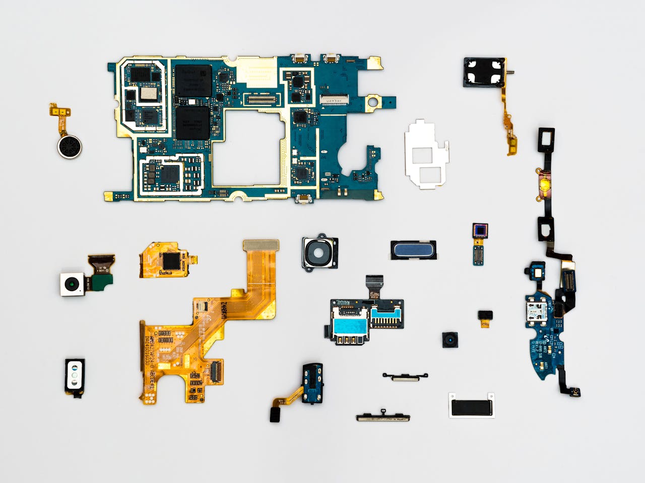 Главная Exploded view of smartphone components showcasing intricate technological design.
